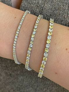 "Adorable ladies or girl's tennis bracelets. Handmade in Italy SOLID 925 sterling Silver finished in rhodium Stamped 925 4-15ct simulated diamonds & yellow sapphire stones Not natural stones but cant tell difference without a microscope and is fraction of price! Nice alternating pattern! SUPER ICED OUT! Secure spring clasp with 2 sided safety clasps! 2-4mm in thickness 6-8.5\" in length 7-14 grams depending on thickness and length" Sapphire Stones, Man Made Diamonds, Sapphire Stone, Ring Size Guide, Yellow Sapphire, Tennis Bracelet, Chain Link Bracelet, Chain Styles, Jewelry Branding