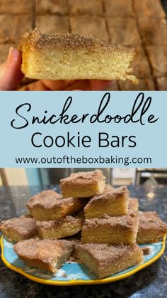 a hand holding up a cookie bar with sugar on top and the words, snickkerdoodlele cookie bars