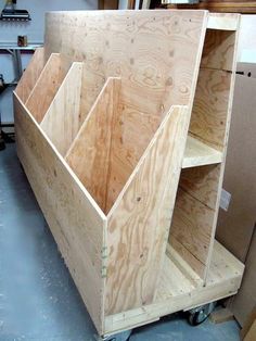 the shelves are made from plywood and ready to be put in place for storage