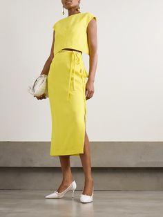 The "free-thinking women and sartorial liberation of the 1930’s South of France" served as the inspiration for Emilia Wickstead's bold and colorful Spring '24 collection. Debuted on the runway, the 'Rieve' midi skirt is made from yellow crepe and has flowing ties at the waist. Wear yours with the matching top. New York Outfit, Emilia Wickstead, Summer Yellow, Casual Clothes, South Of France, Matching Top, Spring Summer Outfits, Jeans Dress, Women Collection