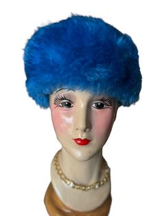 Stunning ..  eye catching rare royal blue vintage 50'/60's hand tailored domed pillbox style mouton hat .. this beautiful hat would look gorgeous with a royal blue outfit .. the hat is in excellent condition has a 9 in opening and stands 5 in tall .. lots of detailed hand stitching on the inside .. smoke and pet free Blue Party Hats For Winter, Blue Formal Winter Hat, Formal Blue Winter Hat, Vintage Blue Hat For Kentucky Derby, Blue Winter Cloche Hat, Vintage Blue Hat For Evening, Vintage Blue Hat For Formal Occasions, Blue Vintage Hat For Evening, Vintage Blue Mini Hats With Short Brim