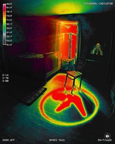 an image of a chair in the middle of a room that is colored red, green and yellow