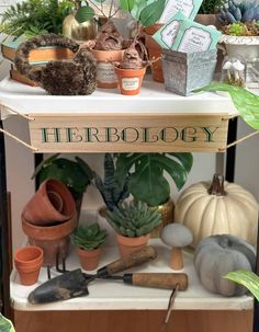 a shelf with potted plants and gardening tools on it that says, goodbye there