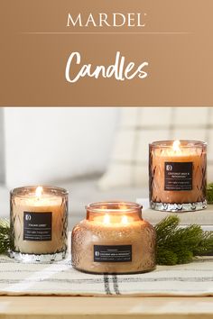 three candles sitting on top of a table next to each other with the words mardel candles