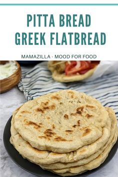 Pitta breads stack on top of each other on grey plate and a souvlaki wrap at the back Easy Pitta Bread Recipe, Greek Pittas, Greek Flat Bread Recipe, Gyros Sauce, Souvlaki Wrap, Pitta Bread Recipe, Soft Flatbread