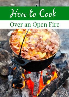 an open fire with food cooking over it and the words how to cook over an open fire