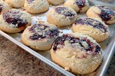 freshly baked pastries on a baking sheet ready to be eaten