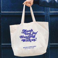 We've designed a tote bag for our everyday hustlers. Cool, casual, yet stylish for when you're always on-the-go. And at only $10 a pop, you can feel good about dragging this bag through the trenches of your daily grind. 15" x 3" x 15" bag Short strap so the bag won't drag 6 oz cotton canvas 1000% champion style Tote Bag Photography, Eco Bag Design, Brand Merch, Cool Merch, Branded Tote Bags, Sac Tote Bag, Tote Design, Coffee Supplies, Vietnamese Coffee