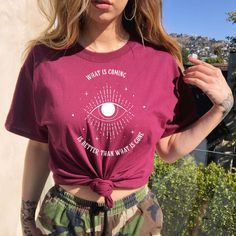 Get ready to be OBSESSED with your new evil eye t-shirt. It's the cutest and most trendy way to emit all those positive vibes!  * Q U I C K * F A C T S * ✺ 100% Cotton  ✺ Runs True to Size ✺ Wash and dry normally (on cool for best results) * S I Z I N G * ✺ Sizing is unisex so runs like men's, though not overly large ✺ Most women find their typical size works best, since they are meant to fit a touch loose ✺ Size guide and fit: See Photo * S H I P P I N G * T I M E S * ✺ Our items are individually made with love for each of our buyers. Because of this, our processing time is 2-5 business days (depending on order volume) plus transit time, but typically much faster. We know our customers want their items as quickly as possible! * K E E P * S H O P P I N G *   ✺ Shop our entire collection he Festival Cotton Tops With Letter Print, Graphic Tee With Moon Print For Festival, Casual Moon Print Tops For Festival, Cotton Tops With Moon Print For Festival, Festival T-shirt With Moon Print And Short Sleeves, Eye Shirt, Seeing Eye, All Seeing Eye, All Seeing