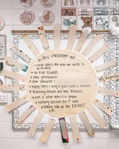 a bulletin board with writing on it in the middle of a room filled with magnets