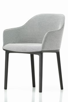 a gray chair with black legs on a white background and the seat is upholstered