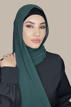 Our Luxury Chiffon hijab-Deep Green is perfect for every occasion. With the softest chiffon fabric we could find, our Luxury Chiffon will become your go to hijab whether you're going out to a fancy party or keeping it casual, looking beautiful is effortless! Fabric: Polyester Chiffon Dimension: 70" x 27" Contour: Long Rectangle Thickness: Light Texture: Smooth Care: Machine or hand wash in warm water, tumble dry or air dry, iron if needed Elegant Green Hijab, Solid Color Chiffon Hijab In Modest Style, Green Long Sleeve Niqab For Eid, Hijab Fabric, Elegant Solid Color Chiffon Hijab, Chiffon Hijabs Photography, Chiffon Hijab, Hijab Niqab, Hijab Pins