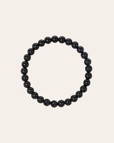 Part of our bead collection, is this fun and chic 6mm black onyx bead bracelet. With an elastic stretch fit, wear it up or down by itself or stacked with your other fine and fashion bracelets for the perfect arm party. Made in L.A. Stretch Fit Black onyx hollow beads Ships in 3-6 business days Rush orders ship in 2-4 business days Comes carefully packaged in a branded Zoe Lev protective sleeve. This item is Final Sale. See here for details. Minimalist Black Onyx Beaded Bracelets, Classic Black Beaded Bracelets, Minimalist Black Hand-strung Beaded Bracelet, Minimalist Black Hand-strung Beaded Bracelets, Minimalist Hand-strung Black Beaded Bracelets, Classic Black Bracelets With 8mm Beads, Black Obsidian Stretch Bracelet With Round Beads, Casual Black Round Stretch Bracelet, Casual Black Beaded Bracelets With 8mm Beads