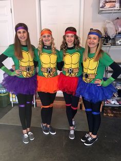 three girls dressed up in teenage mutant costumes