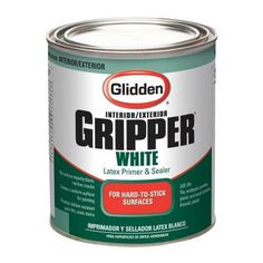 a can of white paint sitting on top of a white flooring sealer with the words, gripper white