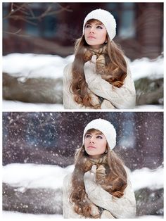 a woman with long hair wearing a white hat and scarf in the snow, looking up at