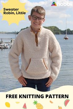 a young boy wearing a sweater and glasses with the text free knitting pattern on it