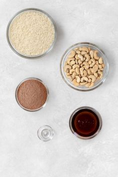 ingredients to make peanut butter cookies laid out on a white surface