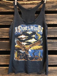 Country Deep Dust in the Wind Racerback tank top Country Deep tank top Next Level Racer back tri blend tank top, 4.3 oz. 50% Poly 25% Cotton 25% Rayon; fits 1/3 size bigger than normal size for a looser fit Stretch Graphic Print Tank Top, Cotton Racerback Top For Workout, Graphic Print Stretch Tank Top, Casual Graphic Print Tank Top, Stretch Tank Top With Graphic Print, Casual Pre-shrunk Racerback Tops, Summer Workout Racerback T-shirt, Cotton Tank Top With Graphic Print, Soft-washed Tank Tops For Summer