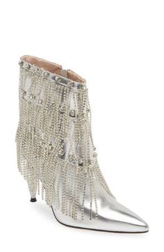 Swaying fringe animates a glam bootie punctuated by glistening rhinestone studs in a tiered formation. 4" heel (size 8.5) 6" shaft Side zip closure Arch support Synthetic upper, lining and sole Imported Asian & Pacific Islander Owned/Founded Silver High Heel Boots With Rhinestone Fringe, Elegant Silver Boots With Rhinestone Fringe, Elegant High Heel Boots With Rhinestone Fringe, Elegant Fringe Boots For Party, Glamorous Rhinestone Fringe Boots For Night Out, Elegant Fringe Party Boots, Pointed Toe Party Boots With Fringe, Party Boots With Fringe And Pointed Toe, Chic Fringe Boots For Party