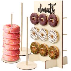 there are donuts on display in front of a sign that says dunkin'donuts