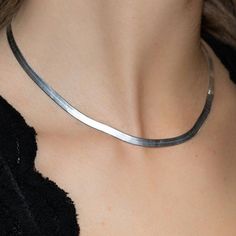 This sterling silver 90's style herringbone necklace is the perfect layering piece.Each piece comes in a beautifully branded gift box or velvet baggie - ready for gifting.Nickel-free. Lead-free.Rhodium plated to prevent tarnishing and scratches.Dimensions:16" long4.4mm wide Silver Snake Chain Choker Necklace For Gift, Trendy Herringbone Snake Chain Necklace As Gift, Trendy Herringbone Choker Necklace For Gifts, Silver Herringbone Necklace With Snake Chain, Trendy Silver Herringbone Snake Chain Necklace, Trendy Silver Herringbone Necklace, Silver Herringbone Necklace Gift, Silver Minimalist Herringbone Choker, Profile Pink