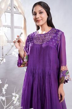 Purple kurta with floral embroidered sleeves, cutwork and pleated yoke. Comes with leggings and slip. - Aza Fashions Festive Anarkali Tops For Spring, Fitted Kurta With Embroidered Sleeves For Spring, Spring Anarkali Top With Long Sleeves, Festive Designer Tops With Embroidered Sleeves, Spring Anarkali Long Sleeve Tops, Fitted Kurta With Embroidered Sleeves, Spring Straight Kurta Blouse With Embroidered Neckline, Spring Embroidered Straight Kurta Blouse, Spring Embroidered Neckline Straight Kurta Blouse