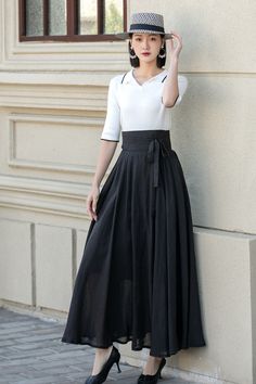 Elegant Flow: Stylish High-Waist Black Maxi Skirt 4900 – XiaoLizi Elegant Spring Pleated Skirt With Belt, High Waist Flowy Skirt With Wide Waistband, Flowy Long Wrap Skirt With Tie Waist, Elegant Skirt With Belt, Elegant Relaxed Skirt With Belt, Spring Wide Leg Pleated Maxi Dress, Spring Pleated Wide-leg Maxi Dress, Belted Full Skirt For Work, Black Full Skirt Maxi Dress For Spring