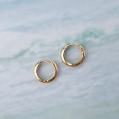 These Small 14k Yellow Gold Huggie Earrings are the perfect basic huggie for any occasion! 14k yellow gold 3mm width 12.5mm Classic Tarnish-resistant Huggie Cartilage Earrings, Minimalist 14k Gold Hoop Earrings With Shiny Finish, Dainty Yellow Gold Huggie Jewelry, Hypoallergenic Minimalist Huggie Earrings For Formal Occasions, Classic 14k Gold-filled Yellow Gold Cartilage Earrings, Classic Gold Plated Cartilage Earrings As Gift, Classic Gold Cartilage Earrings As A Gift, Classic 14k White Gold Cartilage Earrings, Classic Gold Cartilage Earrings For Gift