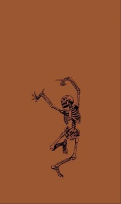 a skeleton dancing with its arms in the air