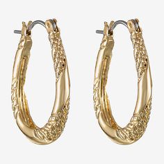 Soon to be a style staple you'll find yourself reaching for time and time again, these small oval hoop earrings feature a polished and textured gold-tone finish.Dimensions: 0.48x0.78"Jewelry photos are enlarged to show detail.# Pieces In Set: 1 PairFeatures: HypoallergenicEarring Back: HingedMetal Color: Gold ToneCare: Wipe CleanEarrings Style: Hoop EarringsMetal: ZincCountry of Origin: Imported Oval Metal Hoop Earrings For Everyday, Everyday Oval Metal Hoop Earrings, Trendy Oval Metal Hoop Earrings, Trendy Oval Hoop Earrings, Jewelry Photos, Oval Hoop Earrings, Earrings Hoop, Gold Texture, Photo Jewelry