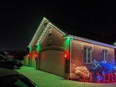 a house decorated with christmas lights and decorations