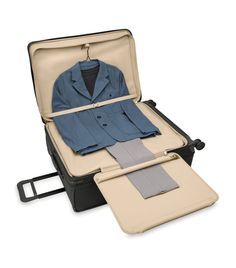 an open suitcase with clothes in it