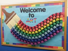 a welcome to art sign made out of construction paper