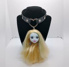 "Handmade OOAK Lagoona Blue choker necklace! Black vegan leather strap with silver colored heart and rhinestone studs. Approx 14\"-15.5\" adjustable snap closure. Made with a real Mattel Monster High Lagoona head that has been customized with nose and ear piercings! Brand new, never worn! NOTE: Some flaws on her lip and face paint (still gorgeous tho!) Keywords: Monster High Student Fairy Kei Fairycore Faecore Fairywave Cute Anime Original Large Big Gift Weird Unique Funny Gift Kawaii Toy Barbie Adjustable Metal Choker For Cosplay, Adjustable Emo Choker For Alternative Fashion, Handmade Adjustable Choker For Alternative Fashion, Adjustable Emo Choker For Cosplay, Adjustable Punk Heart Choker, Adjustable Heart-shaped Punk Choker, Adjustable Silver Choker For Cosplay, Handmade Adjustable Choker For Cosplay, Adjustable Choker For Cosplay