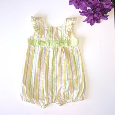 New Without Tags. Ruffles On Shoulder As Accent. Button Up Bottoms Body Suit. Approximate Measurements Length Shoulder To Bottom 15 Inches, Chest 9 Inches. 0072 Green Sleeveless Bubble Romper For Spring, Green Sleeveless Bubble Romper, Multicolor Sleeveless Bubble Romper For Spring, Yellow Cotton Bubble Romper For Spring, Spring Yellow Cotton Bubble Romper, Green Sleeveless Playful Bubble Romper, Yellow Bubble Romper With Ruffles For Spring, Sleeveless Yellow Cotton Bubble Romper, Yellow Bubble Romper For Summer Playwear