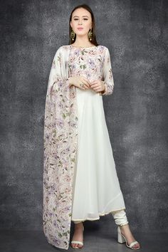 This graceful off-white suit has floral printed bodice and is in circular shape with fine bead detailings on the hem-line and sleeves. It is paired with an elegant digital printed dupatta and matching chudidar for a classic look. Eid Suits, Flow Dress, Eid Outfit, Bespoke Clothing, Eid Outfits, Eid Dresses, Huge Sale, Wedding Dress Couture