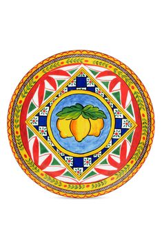 a colorful plate with fruit painted on it