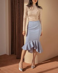 Gorgeous peplum midi skirt cut from high quality stretch twill. Slightly high-waisted for optimal hourglass silhouette. Model is in MINUSEY S. * MINUSEY S = EU34,US2* MINUSEY M = EU36,US4* 69% polyester, 28% rayon, 3% spandex* Professional clean* Made in Korea - Model Height: 172cm/5'7" (US2, EU34)- Free shipping worldwide via FedEx Fitted Pleated Midi Skirt, Feminine Long Lined Pencil Skirt, Long Feminine Lined Pencil Skirt, Feminine Long Skirt With Ruffle Hem, Chic Ruffled Midi Skirt, Knee-length Ruffle Hem Bottoms, Knee-length Ruffle Hem Skirt, Chic Midi Skirt With Ruffles, Elegant Long Skirt With Ruffle Hem