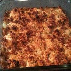 a casserole dish with meat and cheese in it