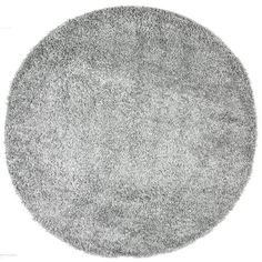 a round gray rug on a white background