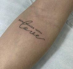 a person with a tattoo on their arm that says, don't stop believing