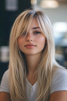 Check out these hairstyles for a long layered haircut to transform your look by adding movement, volume, and a touch of modern flair. Textured Long Hair Straight, Long Blonde Hair With Long Bangs, Straight Blond Hairstyles, Long Straight Hairstyles Curtain Bangs, Curtains Bangs Straight Hair, Long Blonde Hair With Layers Side Part, Girls Haircut Kids Long, Fringe And Long Hair, Bangs Hairstyles Blonde