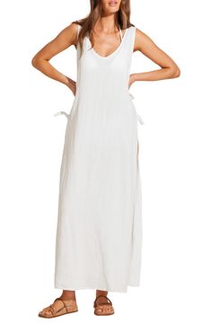 You'll feel like a vintage starlet when you're walking along the beach in this linen-and-cotton dress with an open side that dramatically catches the breeze. 54" length (size X-small) Side ties Deep V-neck Sleeveless 80% linen, 20% cotton Hand wash, dry flat Imported Linen Maxi Dress For Beach Cover-up, Beach Linen Dress With Side Slits, Linen Beach Dresses With Side Slits, Vacation Linen Maxi Dress With Tie Back, Linen Maxi Dress With Tie Back For Vacation, Cotton Beachwear Maxi Dress For Daywear, Cotton Maxi Dress For Beach Daywear, White Beach Dress With Tie Straps, Cotton Maxi Dress For Daywear And Beachwear