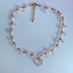 Cute heart pink and pearl necklace choker Pink Heart Beads Choker Jewelry, Pink Pearl Choker, Pink Heart-shaped Choker For Gifts, Necklace Choker Gold, Heart Beaded Necklace, Pink Heart Charm Choker Necklace, Pink Heart-shaped Choker For Valentine's Day, Pearl Necklace Choker, Choker Gold