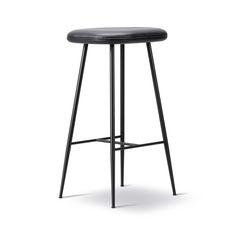 the backless stool with black leather upholstered seat is shown in front of a white background