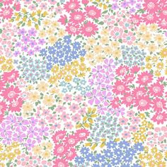 a colorful flower pattern with many different colors and sizes on the surface, including pink, yellow