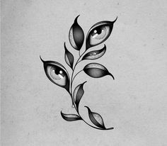 an artistic tattoo design with leaves and eyes