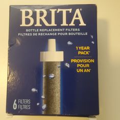 a package of brita filters sitting on top of a table next to a wall