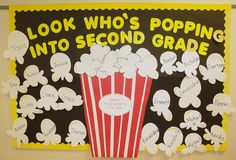 a bulletin board with popcorn on it that says, look who's popping into second grade